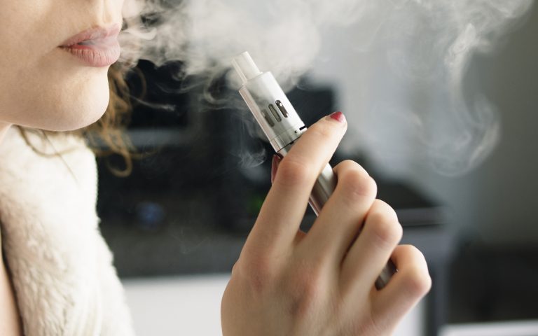 Woman Smoking an E-Cigarette